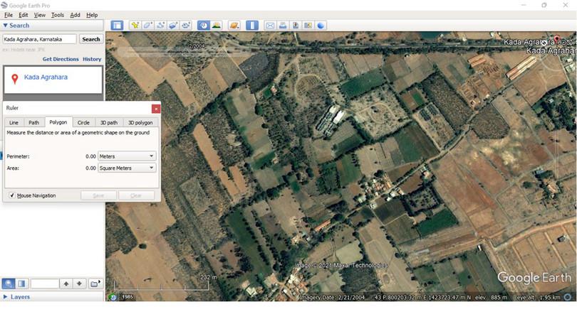 Using the ruler icon to open the measurement toolbox.
: A screenshot showing the use of the measurement toolbox on Google Earth.
