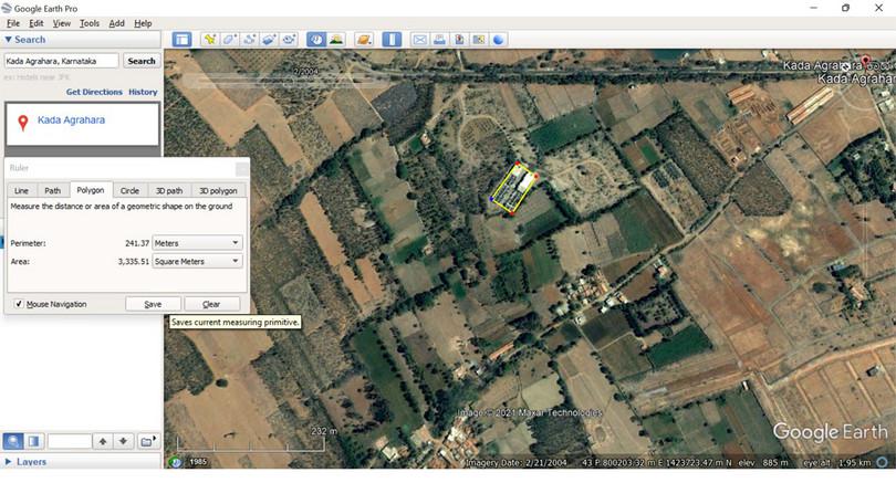 Choosing the polygon icon and selecting an area of your interest.
: A screenshot showing the use of the measurement toolbox on Google Earth, to draw polygons on the map.
