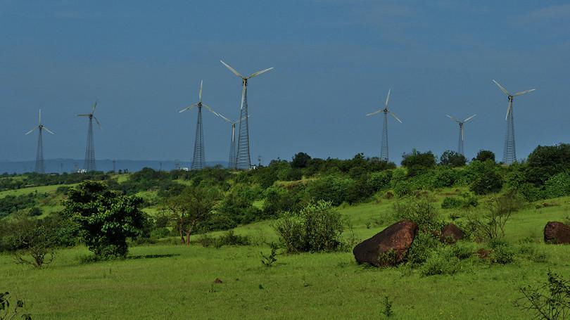 Photograph showing many wind energy windmills on the Chalkewadi Plateau, Satara, in the Western Ghats.
