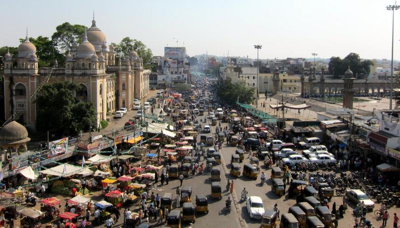 d. The view from Charminar in Hyderabad
: A photograph of a busy market near Charminar in Hyderabad.
