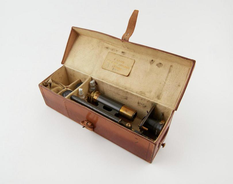 Photograph of Ross’s portable microscope inside a leather case.
